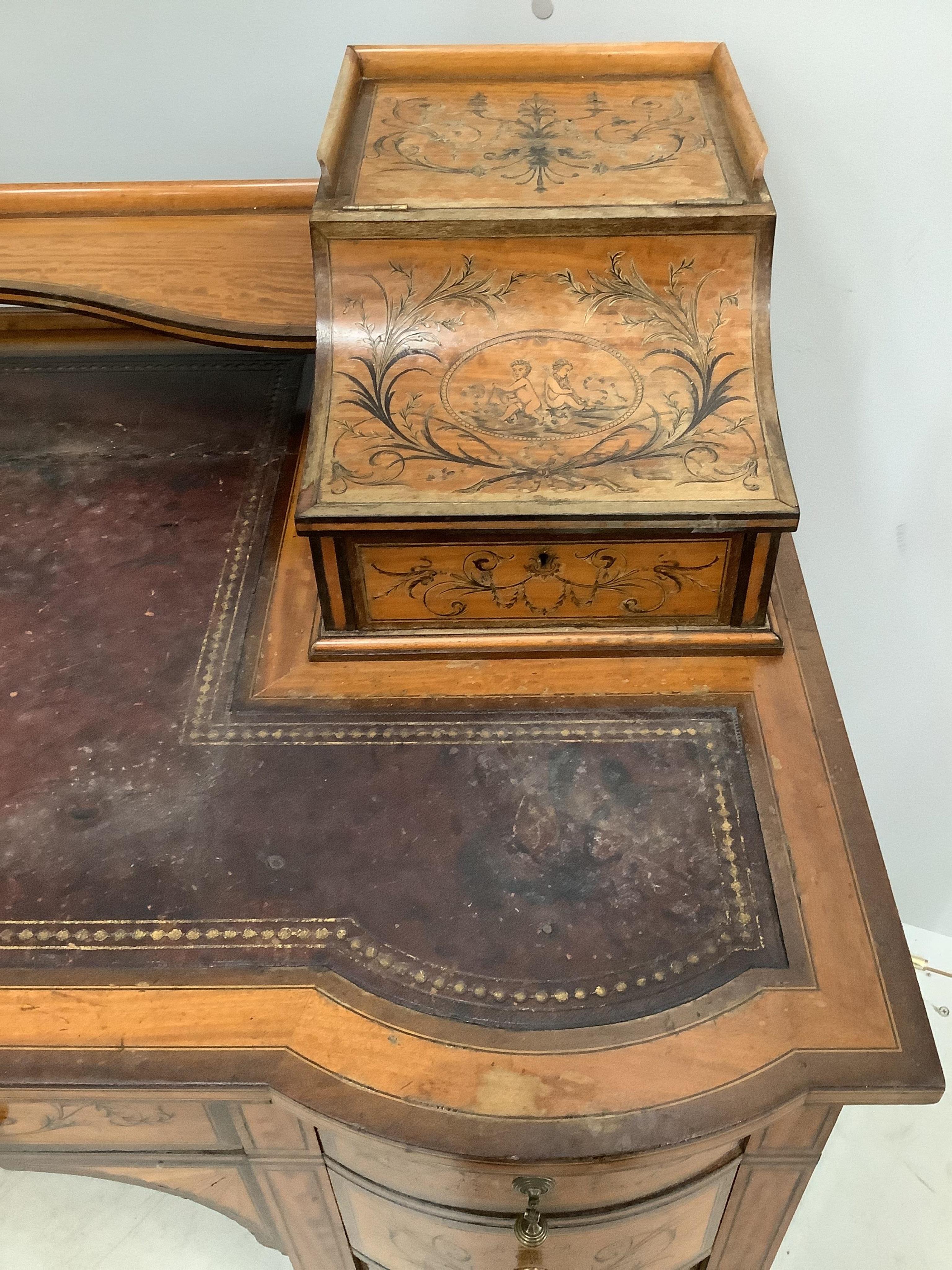 An Edwardian marquetry inlaid Sheraton Revival satinwood kneehole desk, width 106cm, depth 60cm, height 90cm